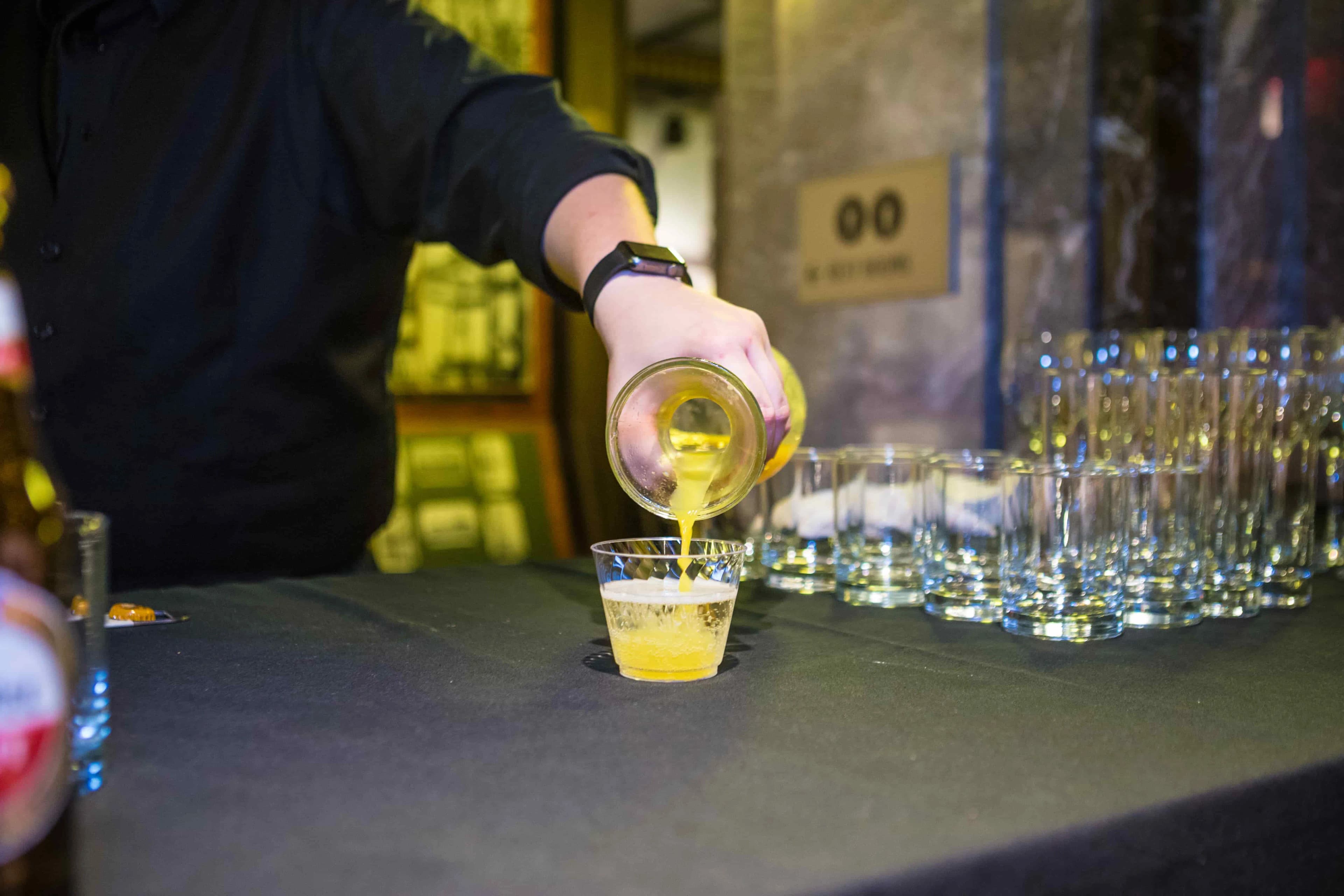 Man pouring drink
