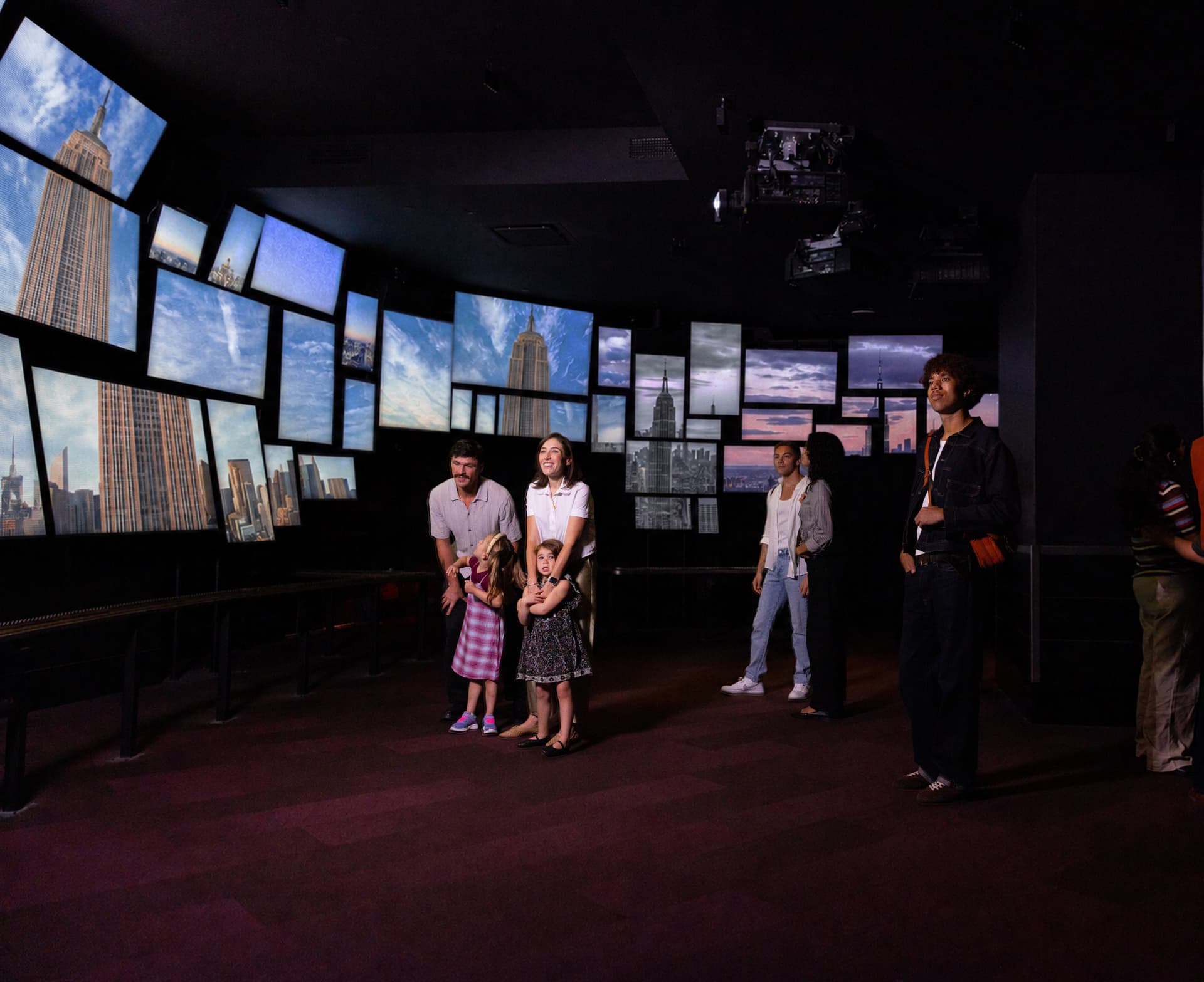 A family at the World's Most Famous exhibit