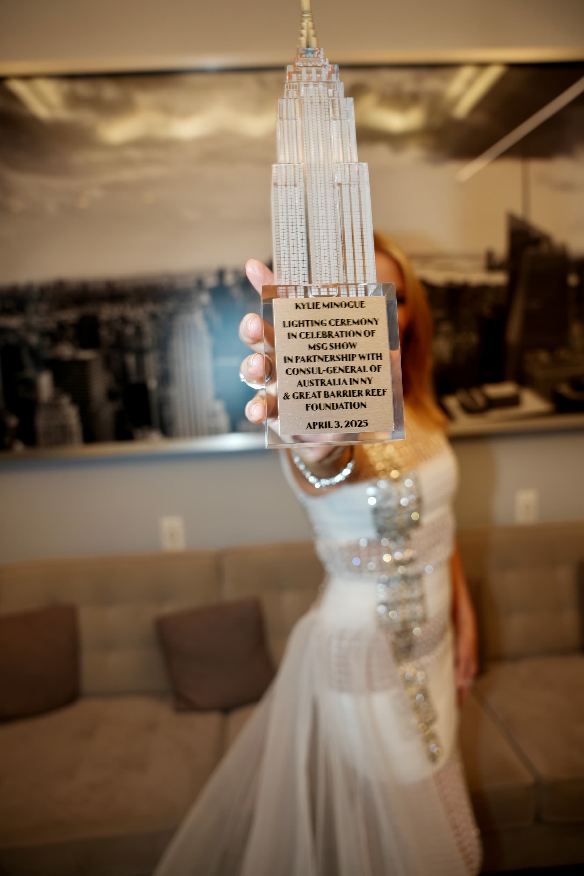 Kylie Minogue holds her ESB model