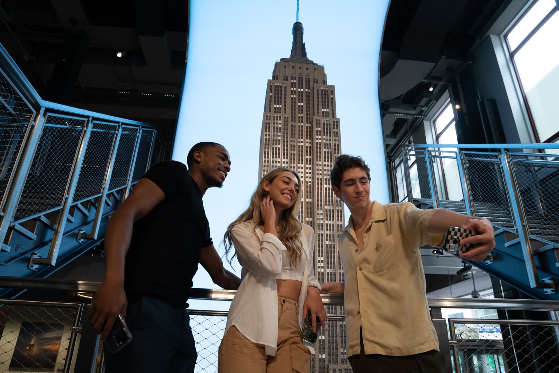 Friends take a selfie at ESB's Grand Staircase