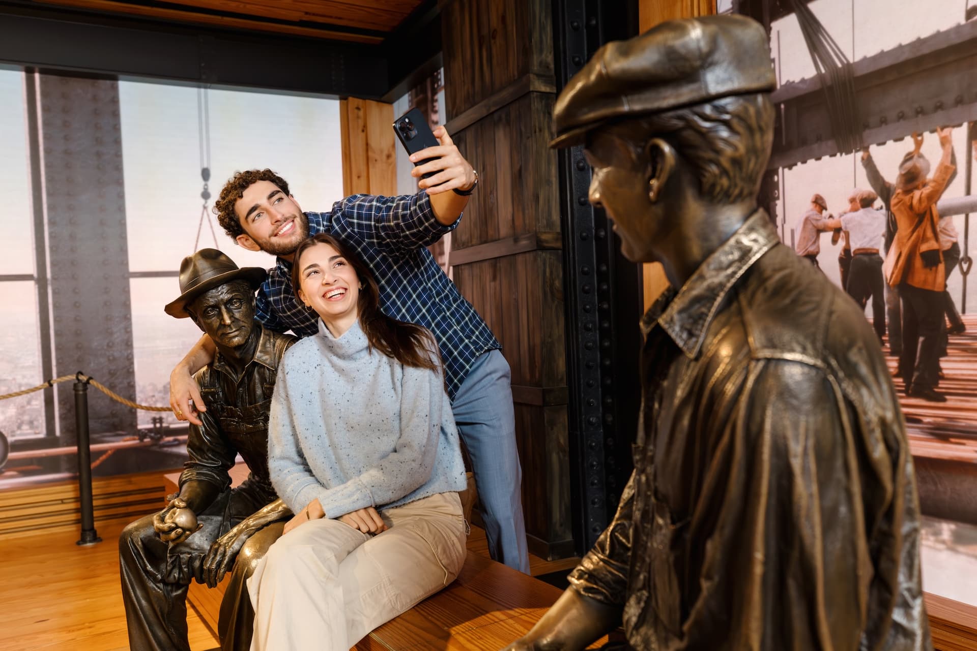 Couple taking selfie at the Empire State Building's 2nd Floor Exhibit Construction