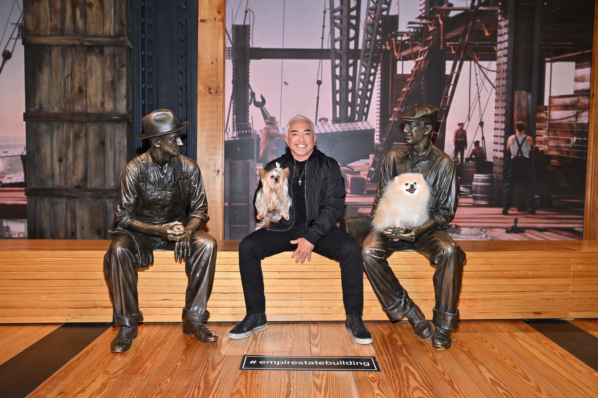 Cesar Millan poses at the Construction exhibit
