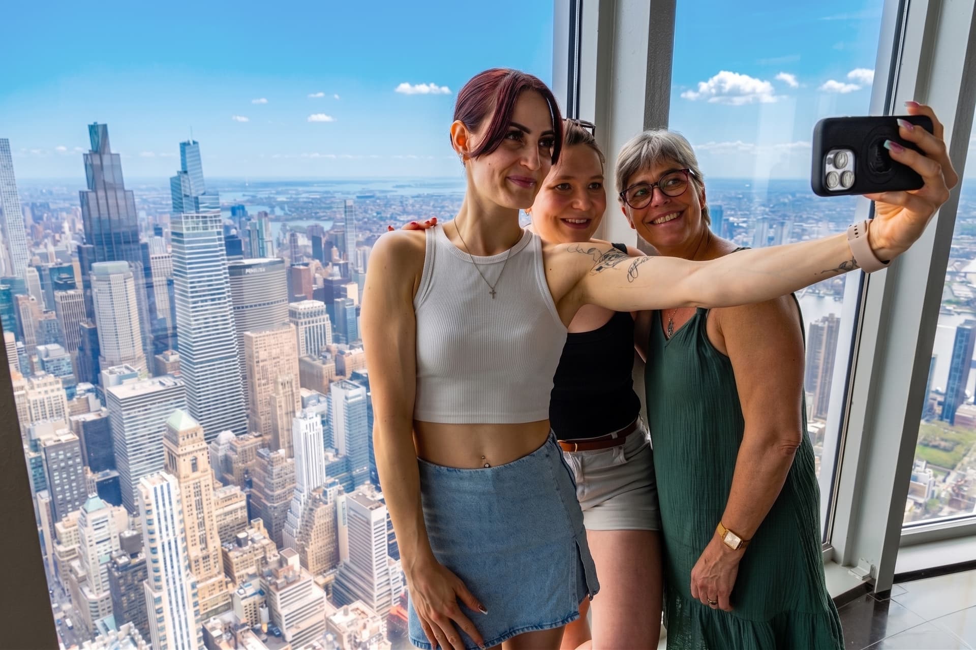 Family taking a selfie on the 102nd Floor Observation Deck
