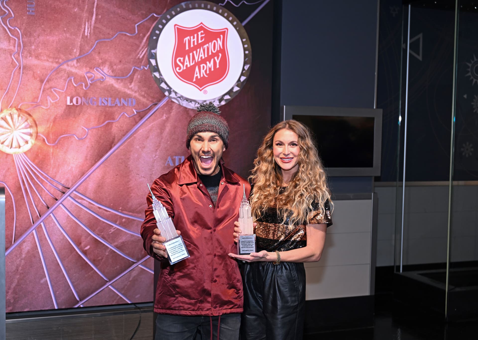 Carlos and Alexa PenaVega with their Empire State Building statues