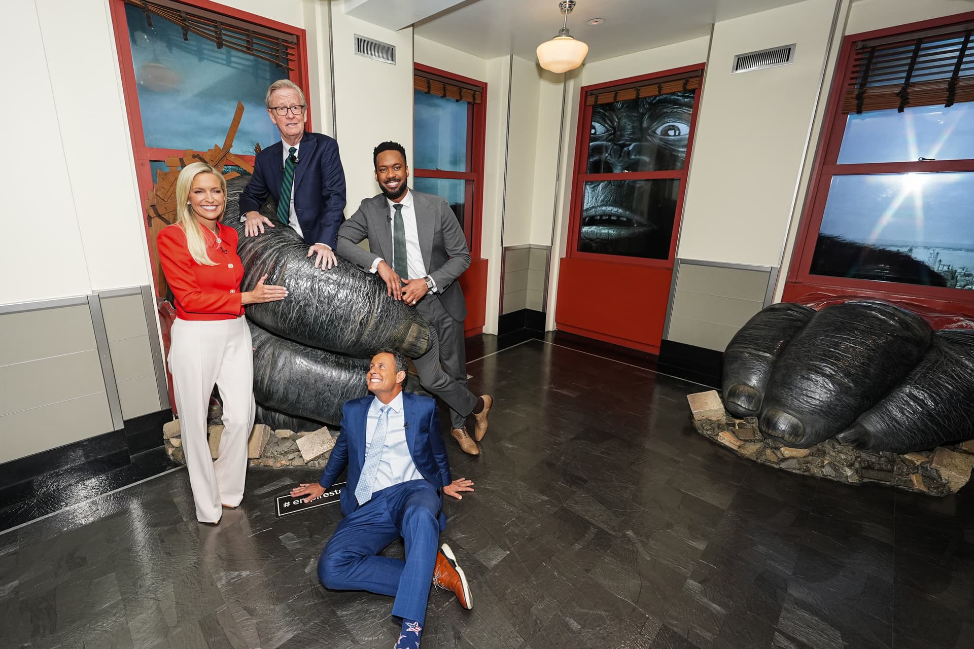 Steve Doocy, Ainsley Earhardt, Brian Kilmeade and Lawrence Jones at the Kong exhibit