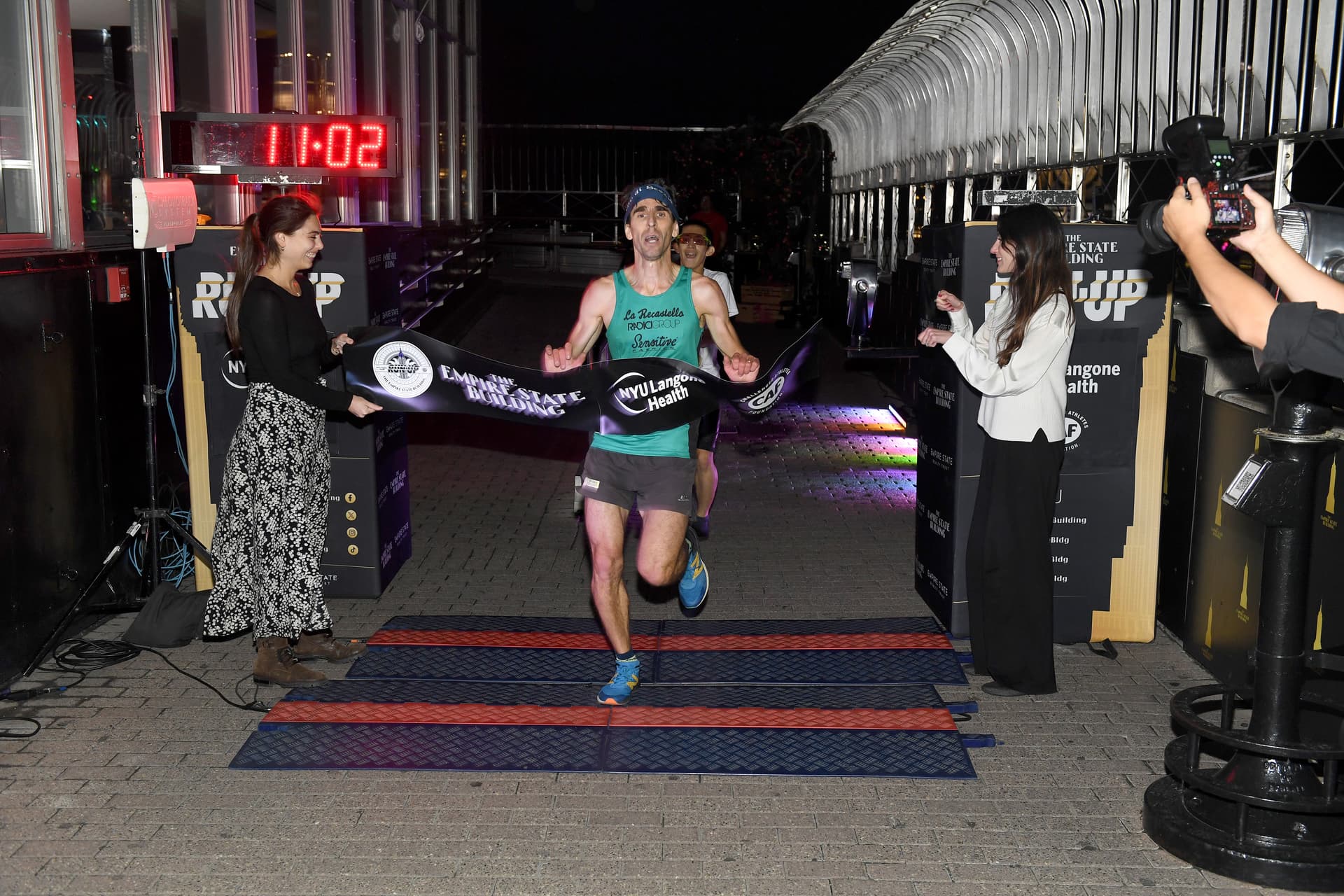 Men's elite winner at the finish line