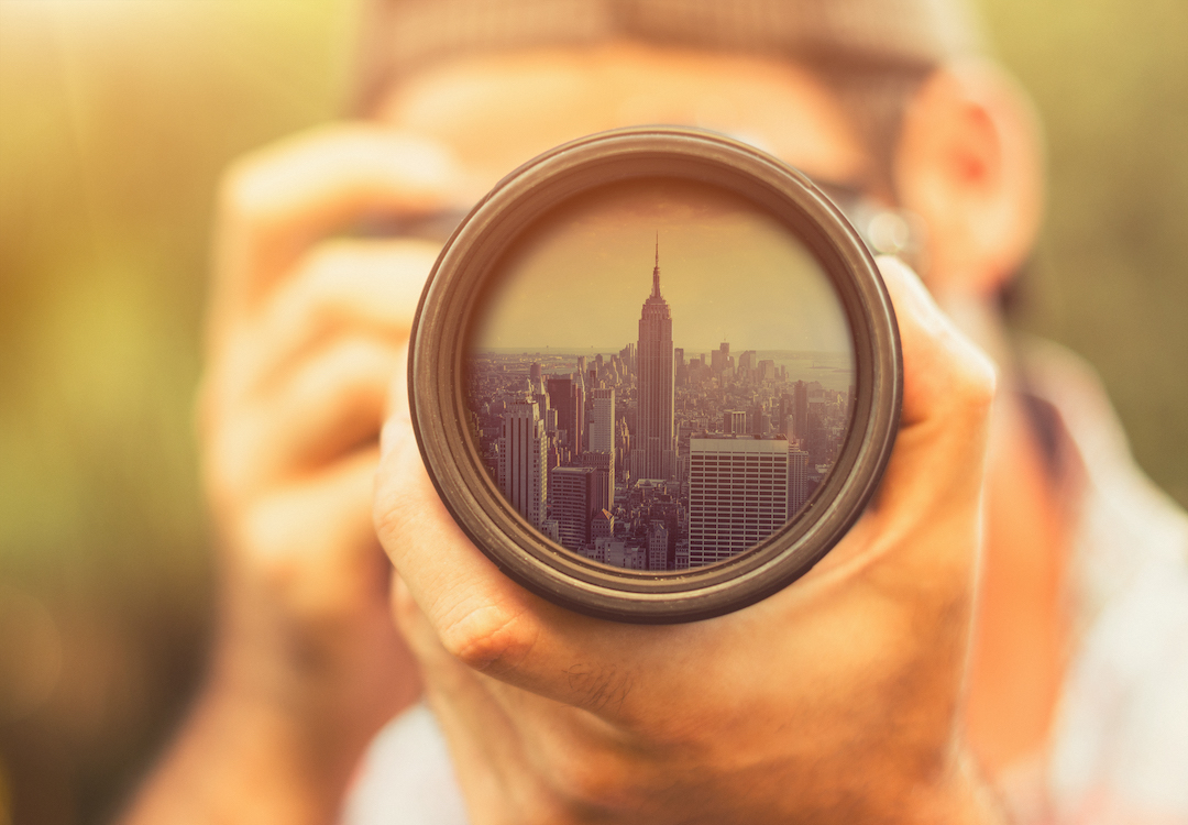 camera pointing at empire state building