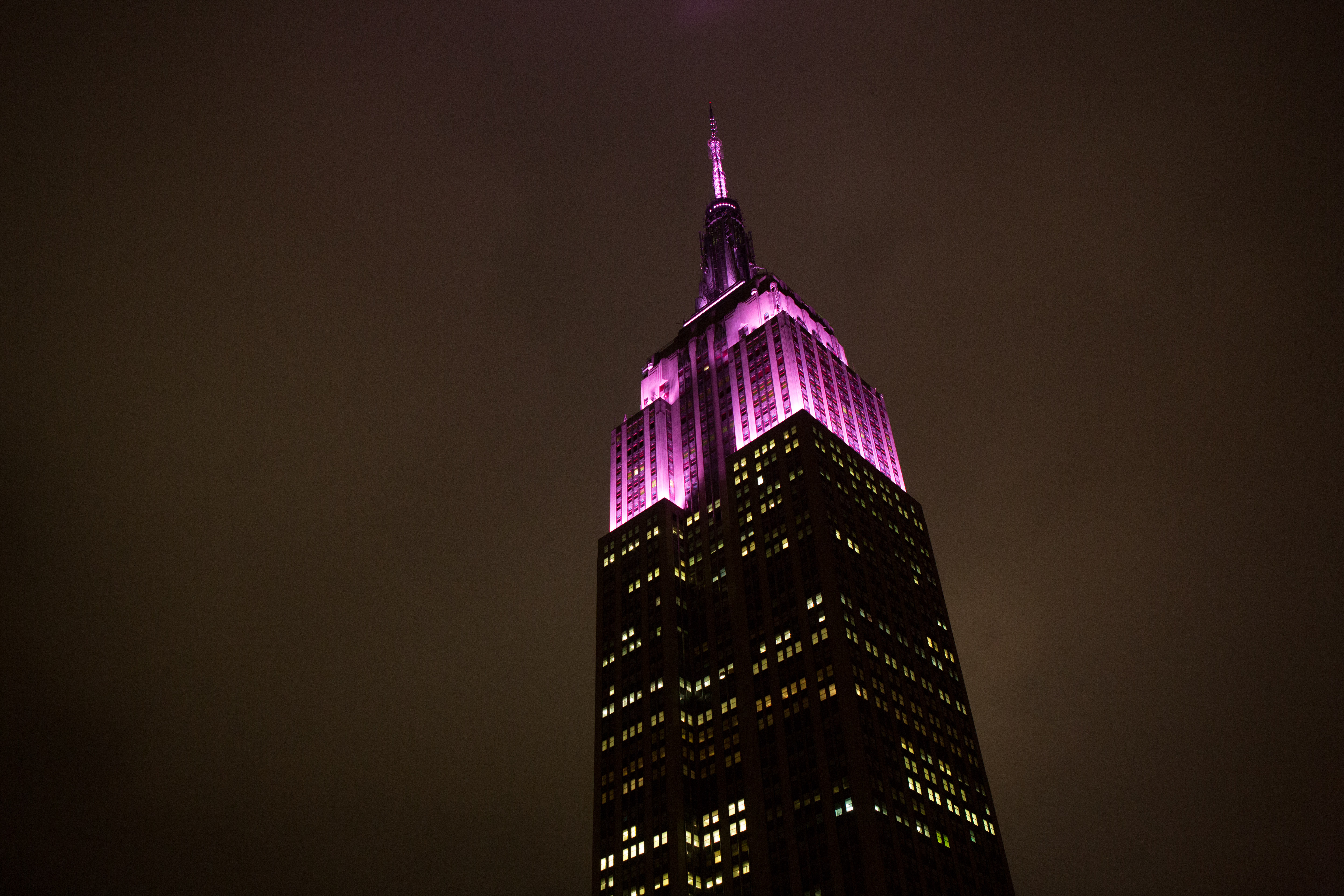 empire state building in pink lights