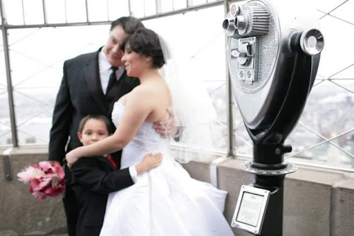 Aaron and wife and kid at empire state building