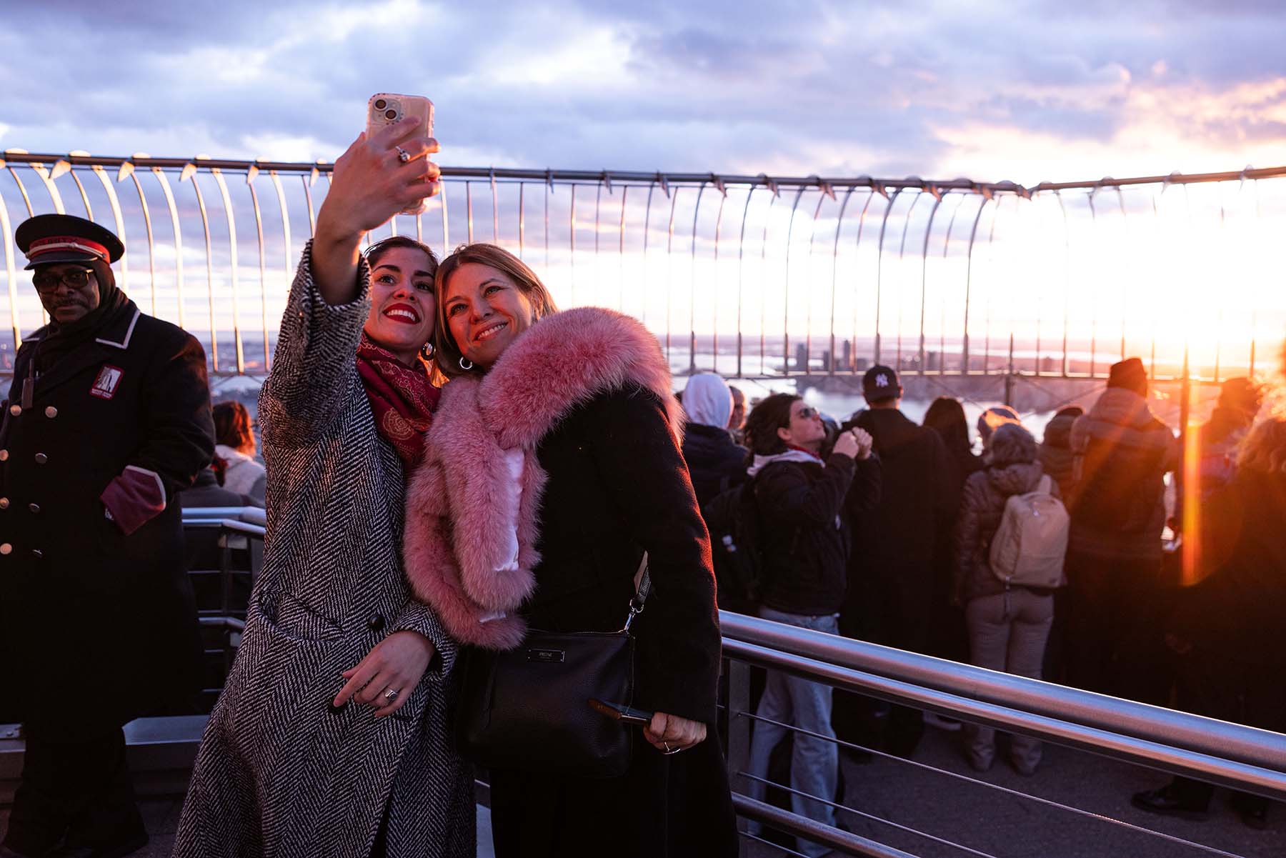 Two women taking selfie on the ESB's 86th NYC Observation Deck