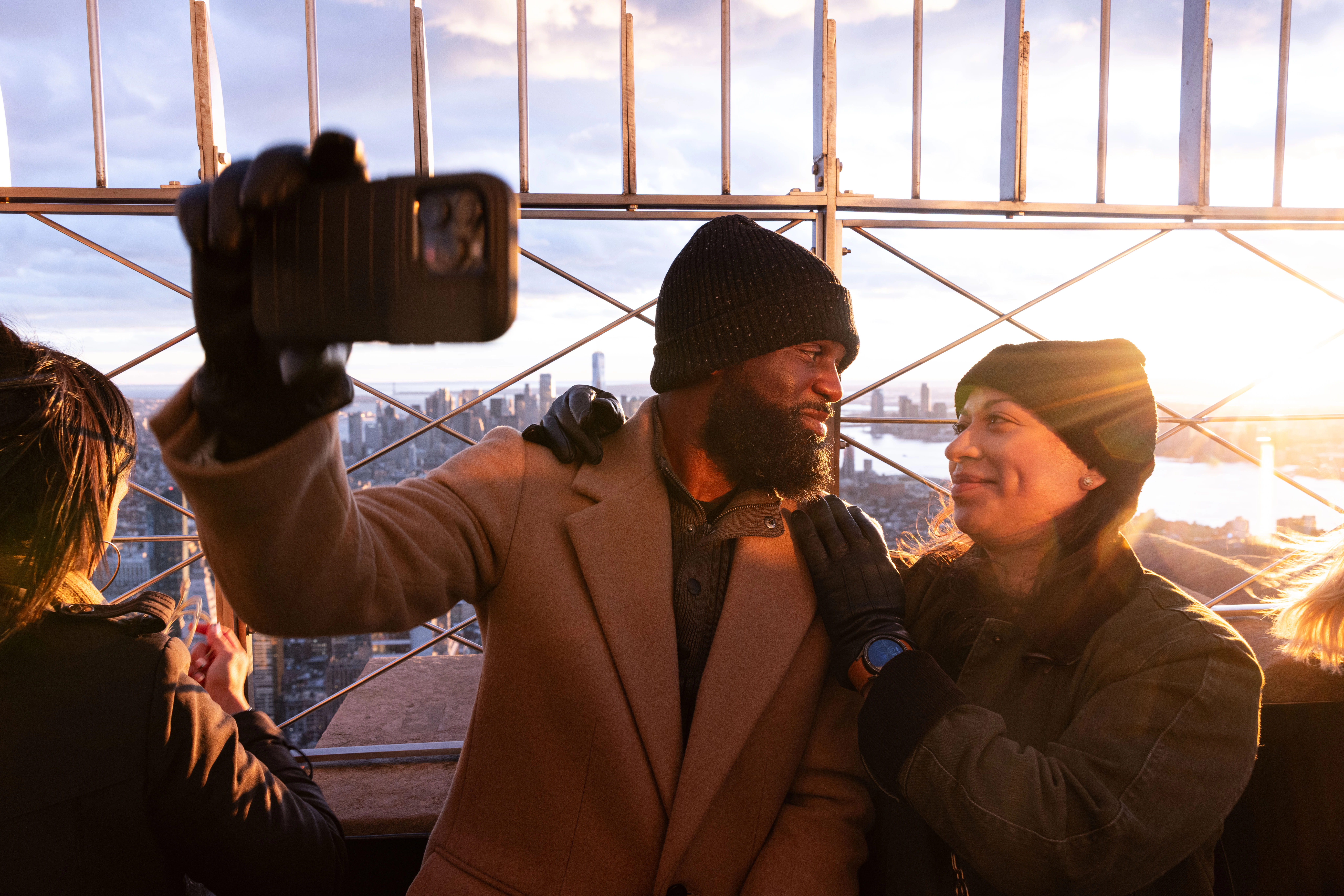 Couple at the Empire State Building 86th Floor Observation Deck in the winter