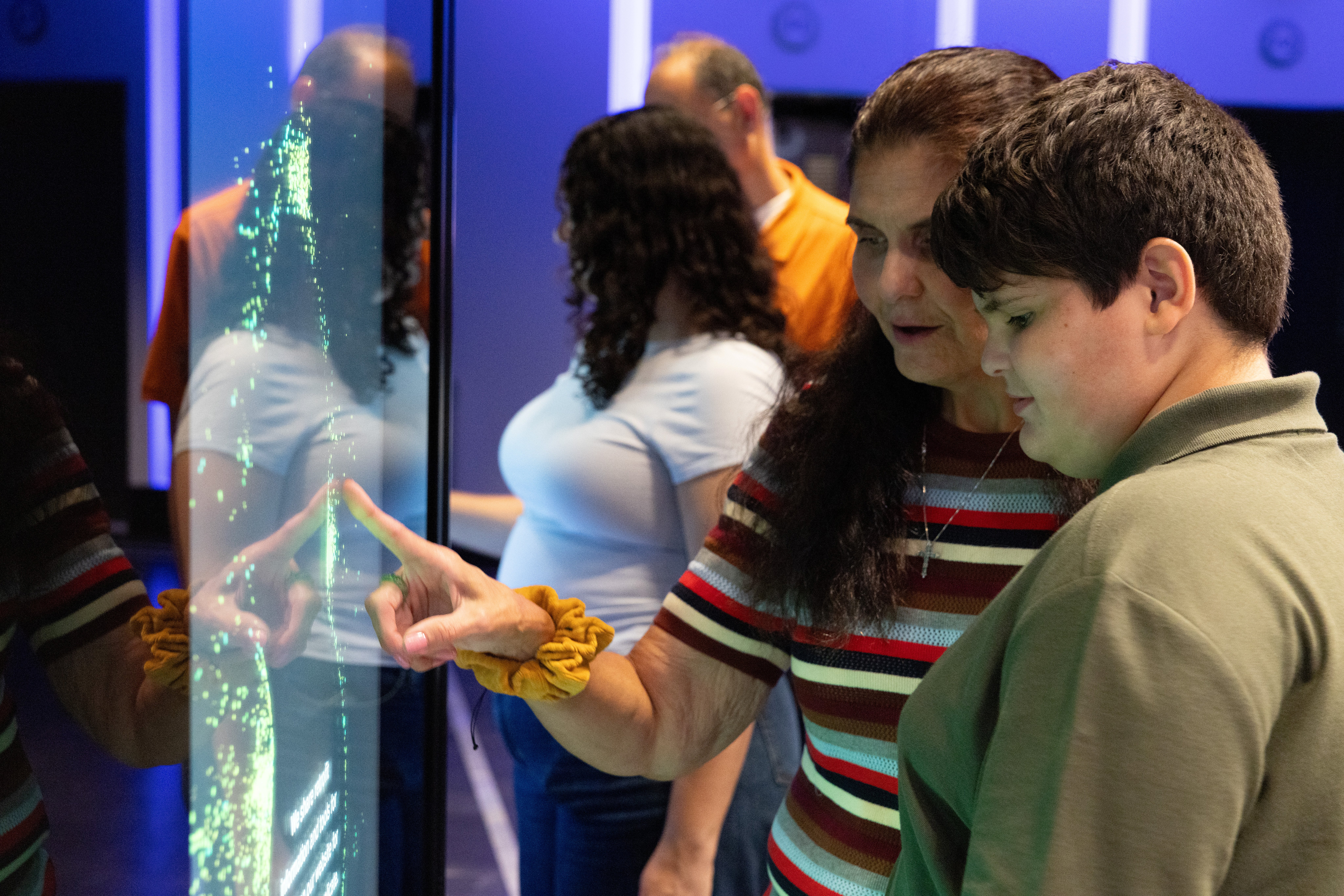 A family at the Modern Marvel exhbit