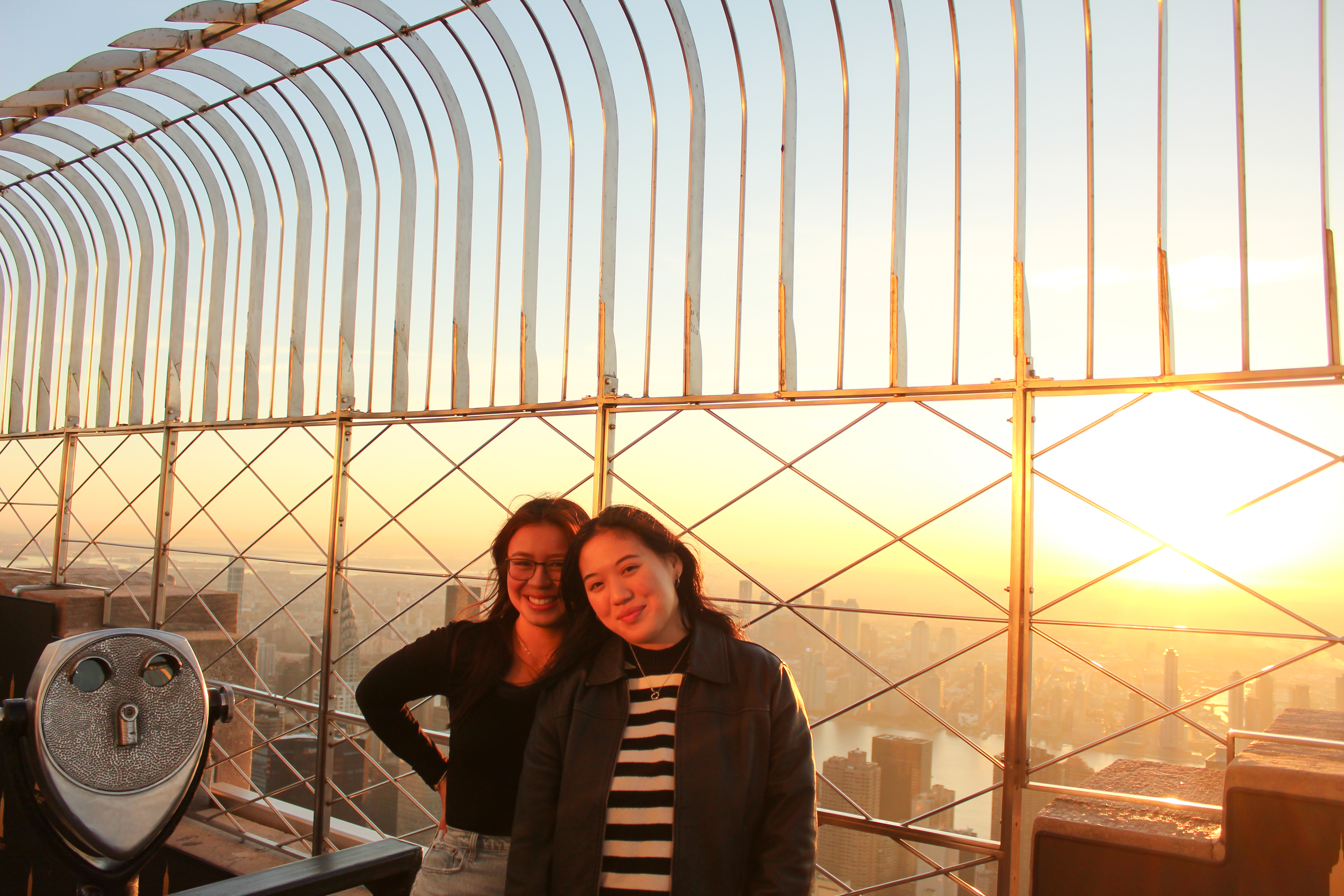 Two friends at sunrise on the 86th Floor Observation Deck