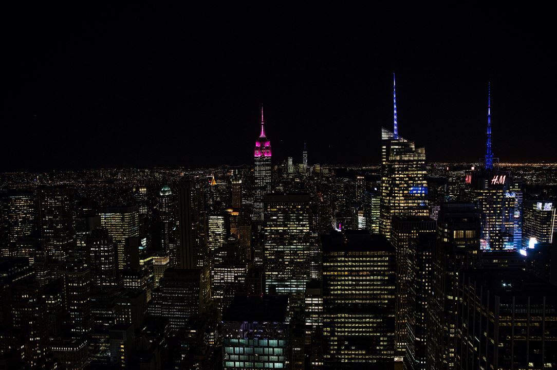 ESB lit up in Magenta at night