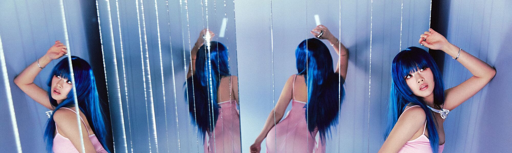 BIBI poses in mirrors for her new album, Eve: Romance