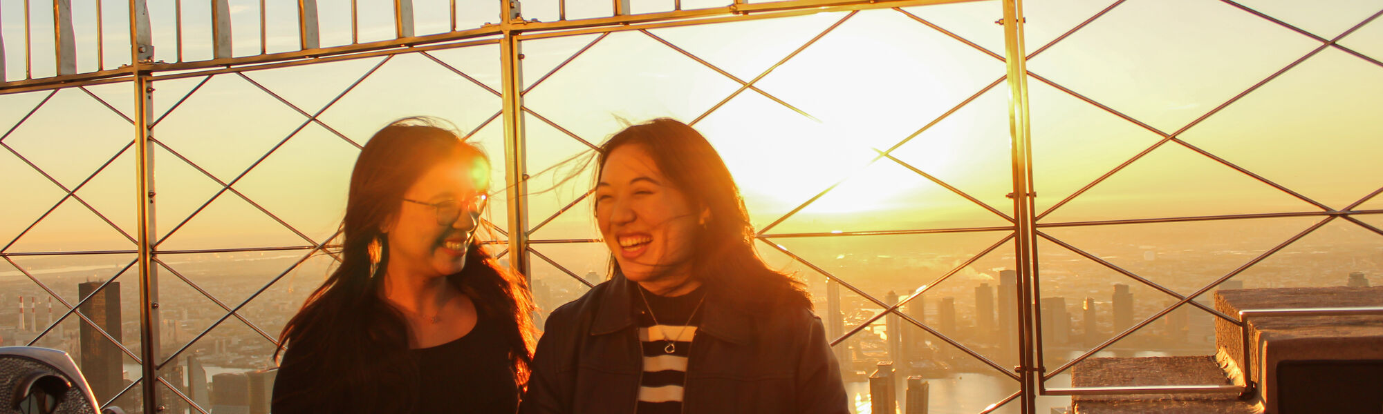 Guests enjoying sunrise at the Empire State Building