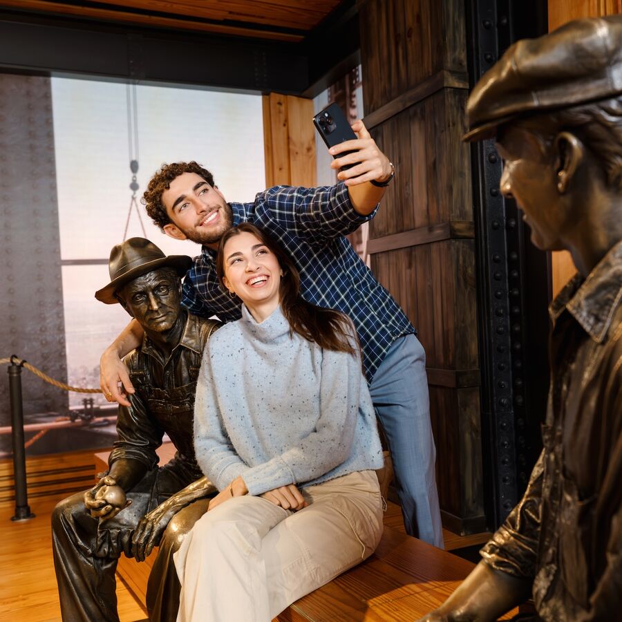 Couple taking selfie at the Empire State Building's 2nd Floor Exhibit Kong