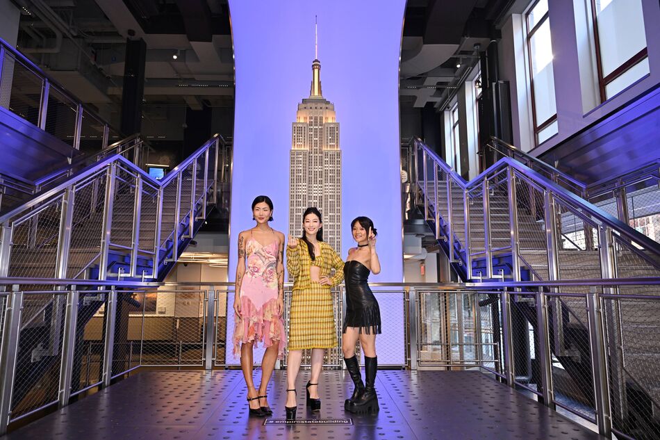 Arden Cho, May Hong, and REI AMI at the Grand Staircase