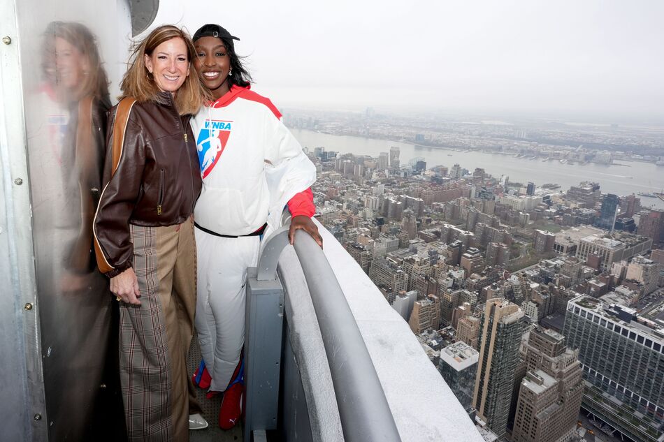 Kathy Engelbert and Flau'jae Johnson on the 103rd Floor