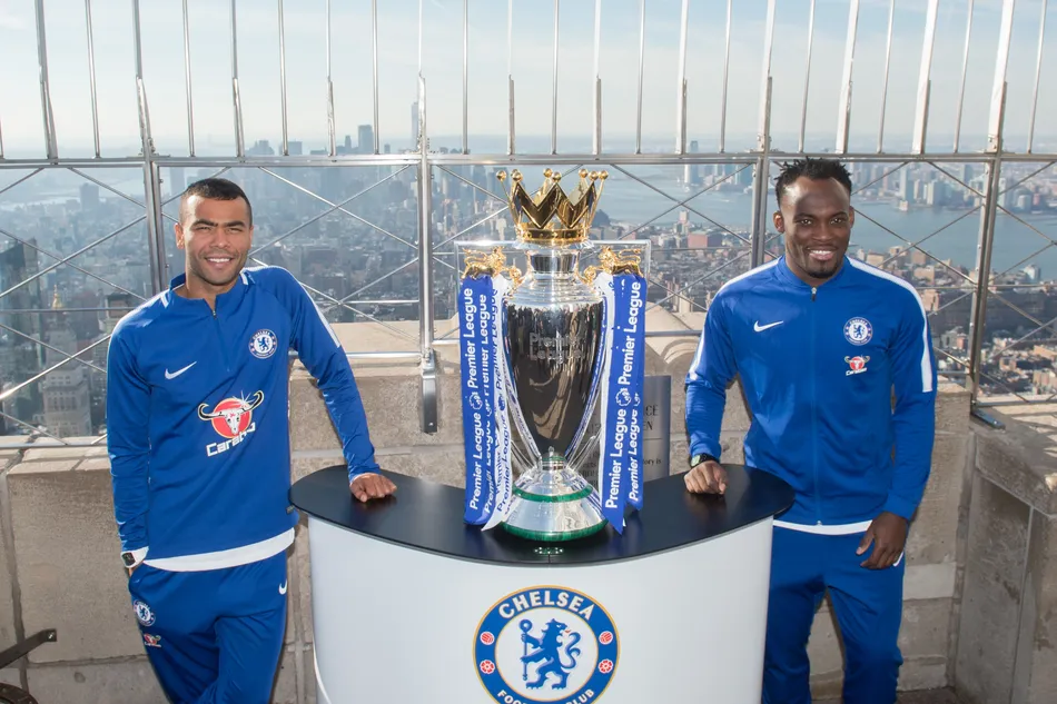 The Empire State Building hosts former Chelsea FC legends Ashley Cole and Michael Essien with the Premiere League Trophy