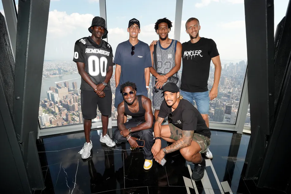 Malick Diouf, Maxwel Cornet, Nayef Aguerd, Jean-Clair Todibo, Alphonse Areola and Tomáš Souček of West Ham United FC visit the Empire State Building on July 28, 2025 in New York City.