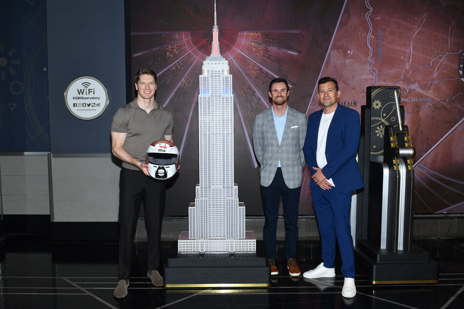 Josef Newgarden, Kyle Kirkwood, and Will Buxton at the lighting ceremony