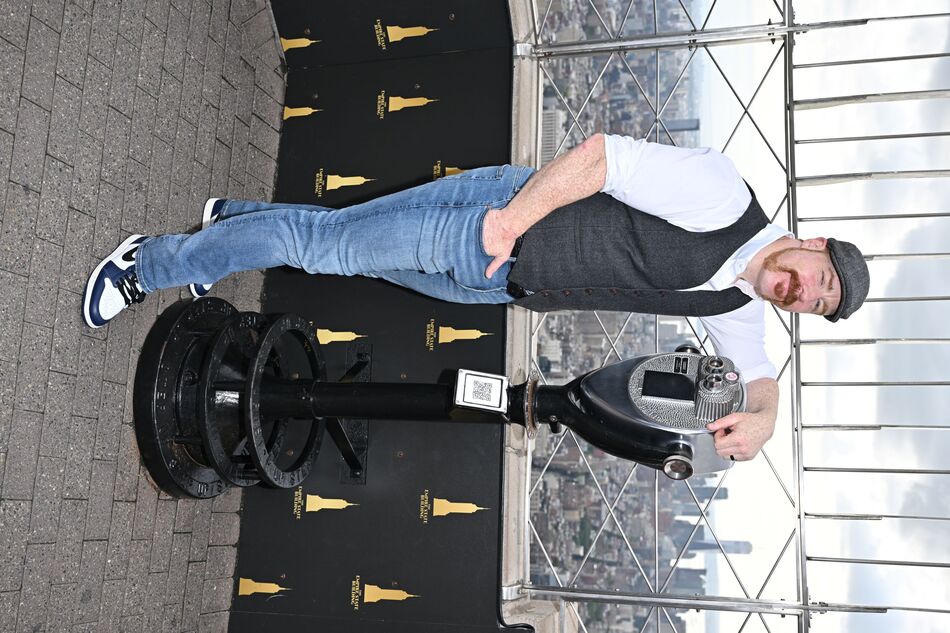 Sheamus posing for a photo on the 86th Floor at the Empire State Building Observatory