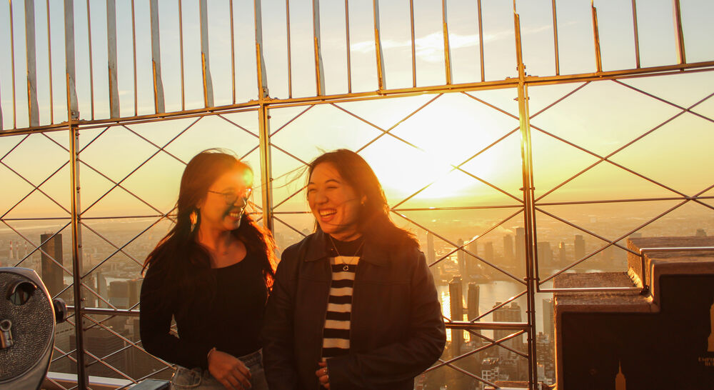 Guests enjoying sunrise at the Empire State Building