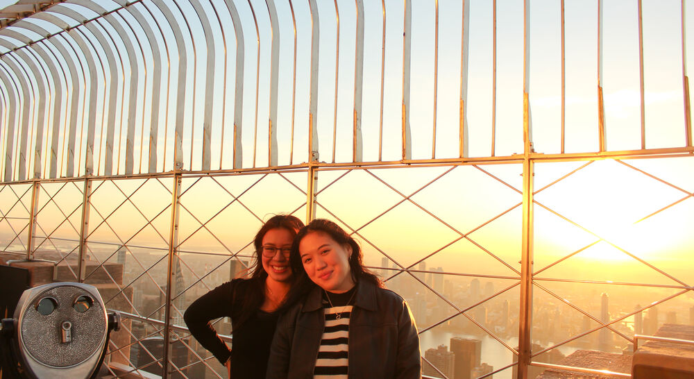 Two friends at sunrise on the 86th Floor Observation Deck