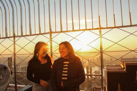 Guests enjoying sunrise at the Empire State Building