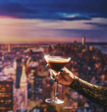 An espresso martini with the NYC skyline