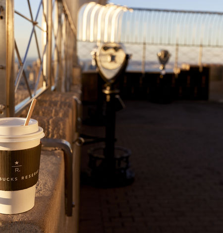 A Starbucks Reserve cup on the 86th Floor Observatory