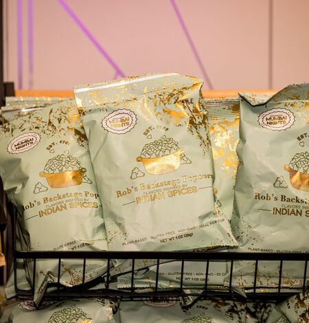 Popcorn display of confections table at The Empire State Building holiday movie screening of Home Alone 2