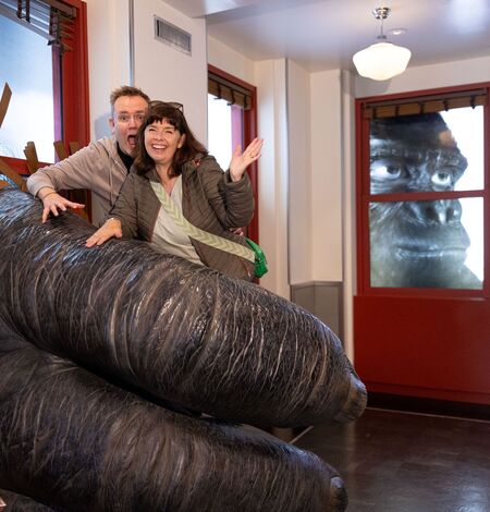 People taking a photo at the Kong exhibit at the Empire State Building Observatory museum experience