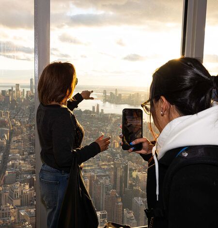 People taking photo on the Empire State Building 102nd Floor Observatory, NYC's best vista point