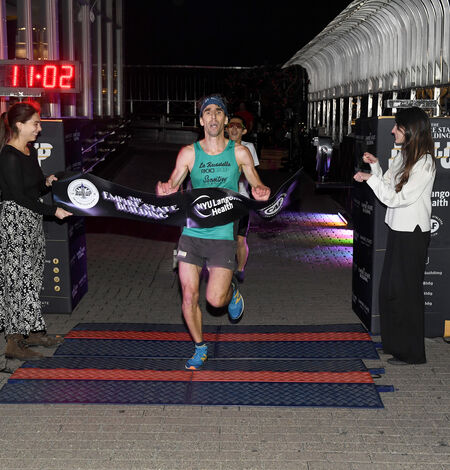 Men's elite winner at the finish line