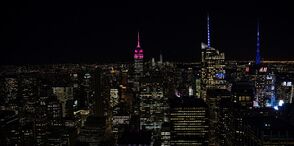 ESB lit up in Magenta at night