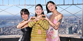 Arden Cho, May Hong, and REI AMI on the 86th Floor Observatory