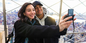 Couple taking a selfie on the 86th Floor Observation Deck of the Empire State Building