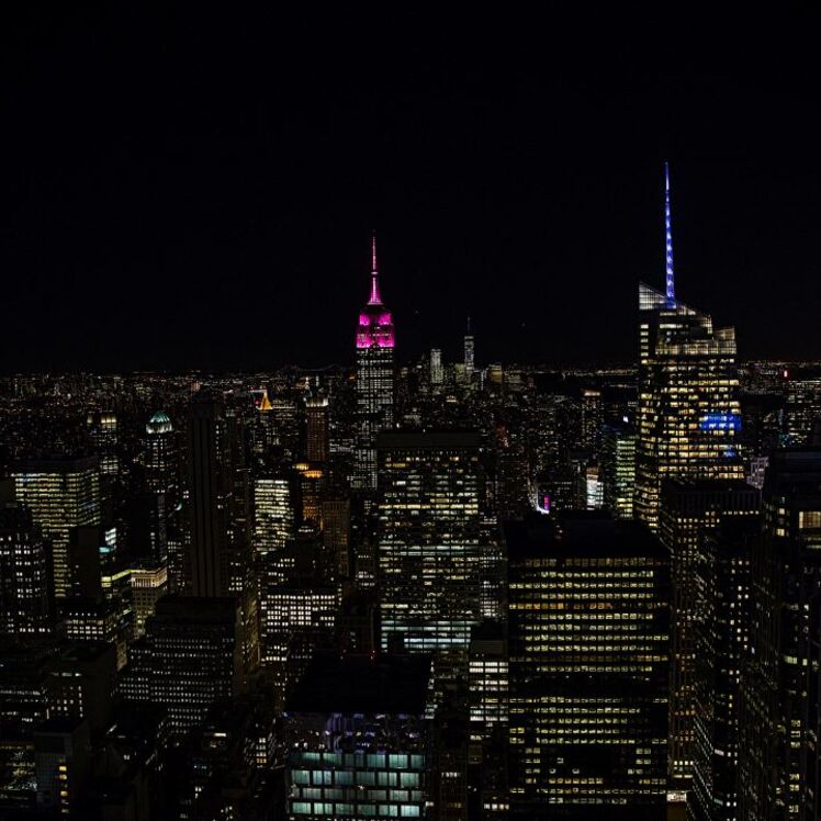 ESB lit up in Magenta at night