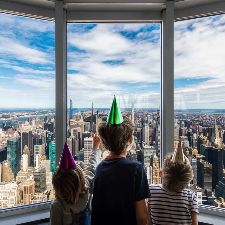 Children at the Empire State Building Observatory's 102nd Floor Observatory