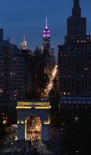 Empire State Building Lit Purple and White for NYU Commencement